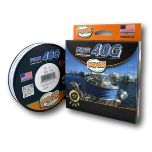 FINS US Made 40G Composite Superline Fishing Braid package with spool of line beside it. FINS US Made 40G Composite Superline Fishing Braid package with spool of line beside it.