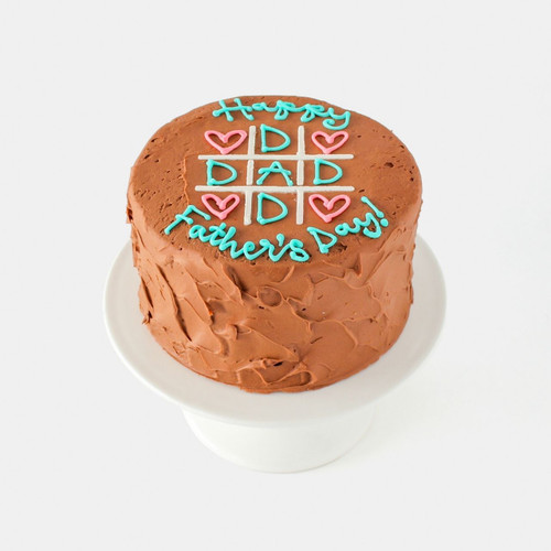 Tic-Tac-Toe Dad Old-Fashioned Chocolate Celebration Cake decorated with Father's Day themed chocolate frosting design from SusieCakes view 1