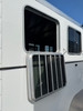 Triple C Trailers 2023 Teton Horse Trailer | 2H, SWING-OUT SADDLE RACK, DOOR ORGANIZER, EXT LOAD LIGHTS, WINDOWS, SPARE (charmac logo)