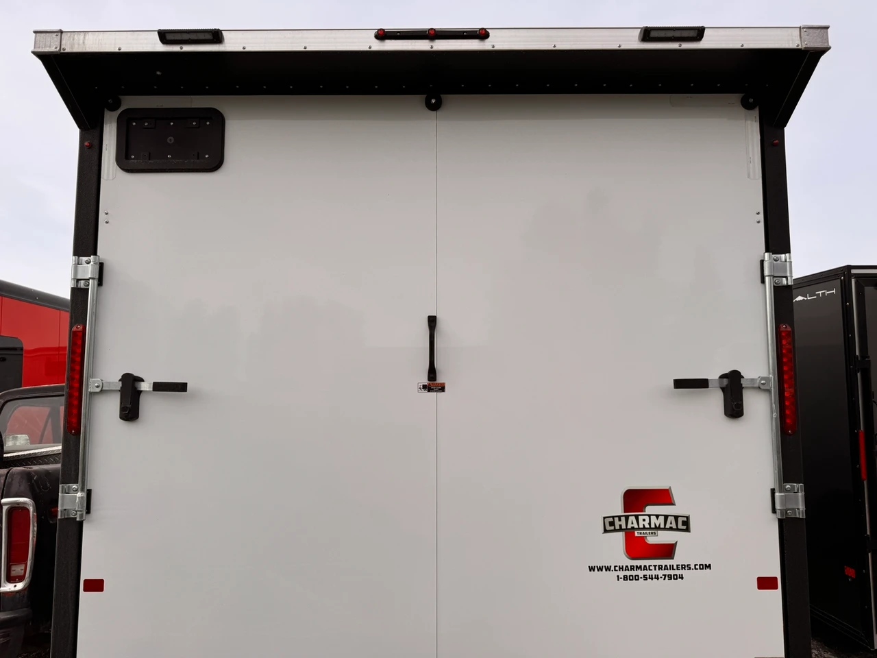 Charmac Trailers 2025 2025 336" Powersports Trailer | Tandem Axle Axle | Kitchen Base, Hydraulic Jack, Water Pkg, Shower Pkg, 30Amp Power Center, 14K Torsion W/ 2 Des Heaters