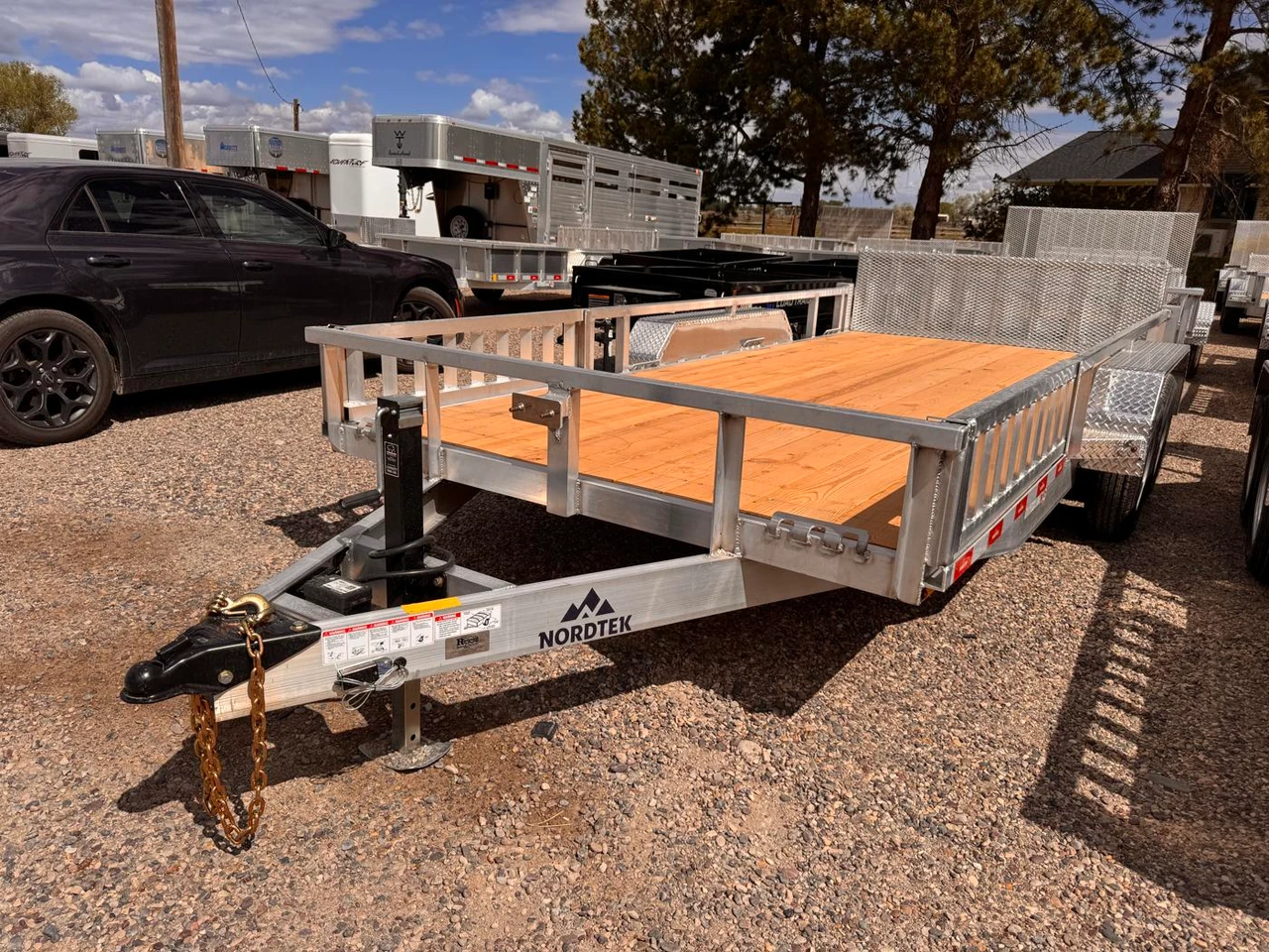 Nordtek Trailers 2026 2026 82"X16' Utility Trailer | Tandem Axle Axle 7K | Wood Deck Open Sides Brakes Both Axles, With Side Load 7K