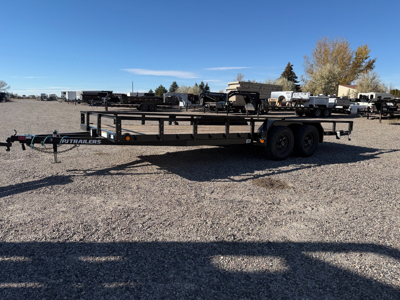 P.J. Trailers 2026 2026 83"X20' Utility Trailer | Tandem Axle Axle 10K | 12" OC Crossmembers, ATV Side Load, Straightdeck Pull-Out Ramps 10K