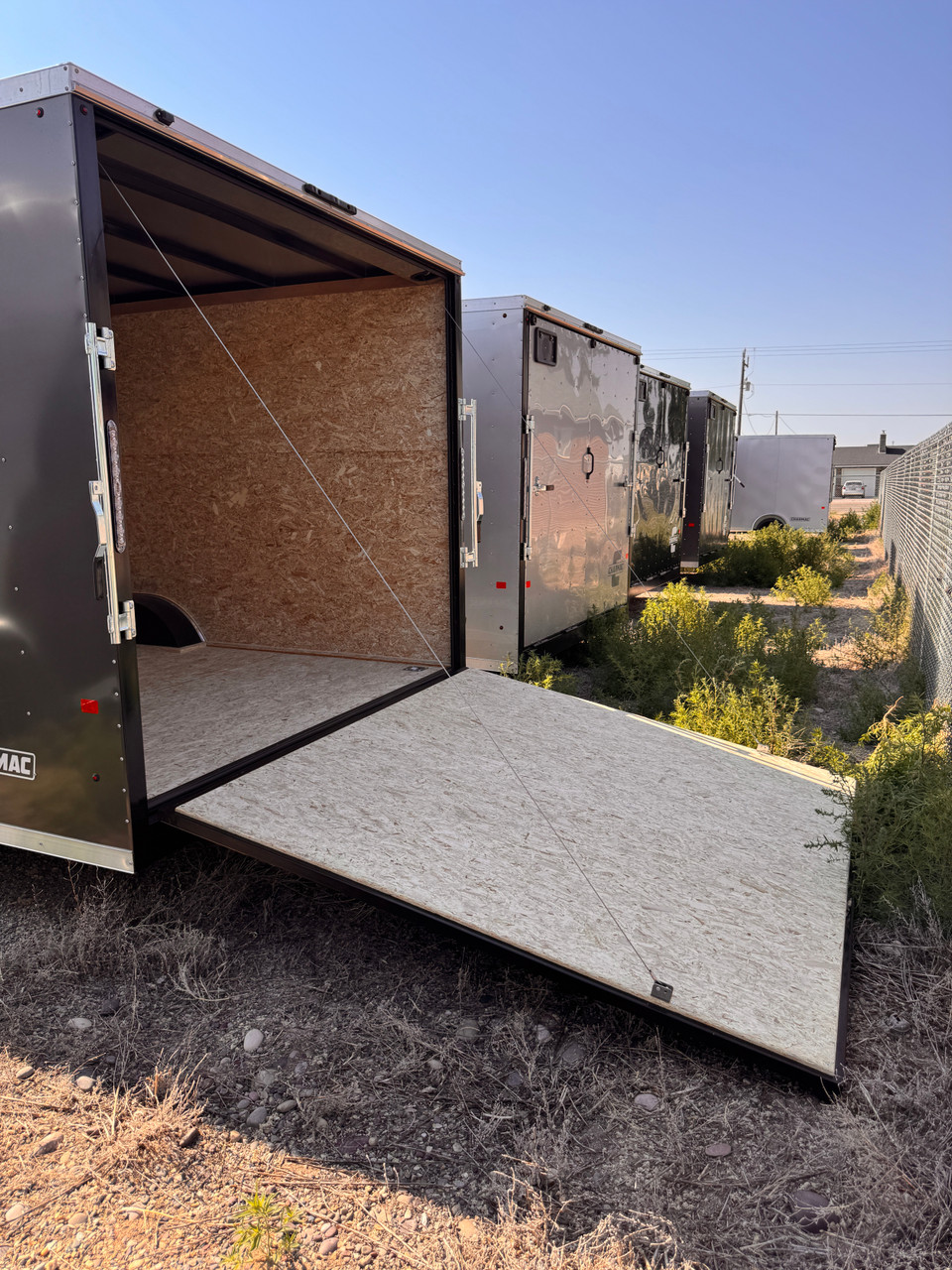Charmac Trailers 2026 ATLAS 100"X24' V-Nose Cargo Trailer | Tandem Axle Axle 9.99K, 7' Tall, Spring Axles, Rear Ramp Door, Driver Side Access Door,