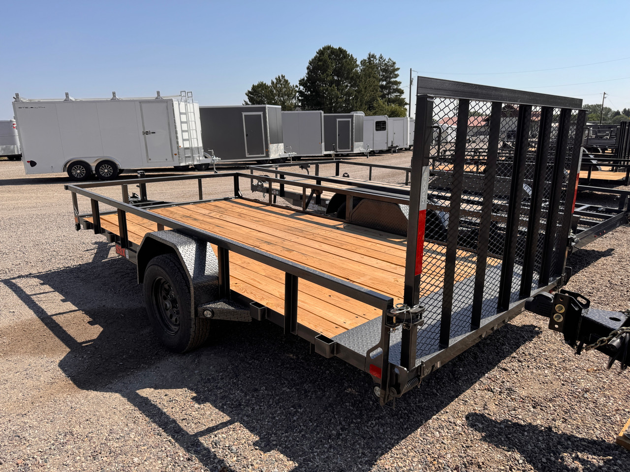 Maxx-D Trailers 2027 S3X 83"X14' Utility Trailer | Single Axle Axle 2.99K, 4" Channel Frame, Tongue, Tube Rail, 1' Dovetail, 4' Rear Rampgate, Spare Tire Mount