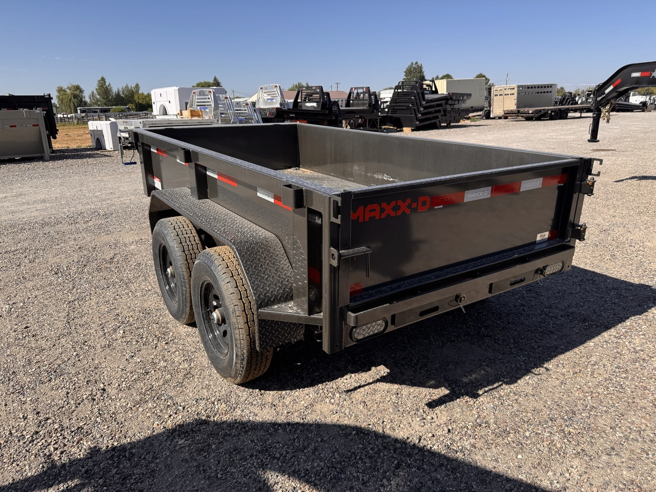 Maxx-D Trailers 2027 D6B 60"X10' Single Ram Dump Trailer | Tandem Axle Axle 9.99K, 18" Solid Sides, Slide In Ramps, Side Swing Gate, Tarp Kit