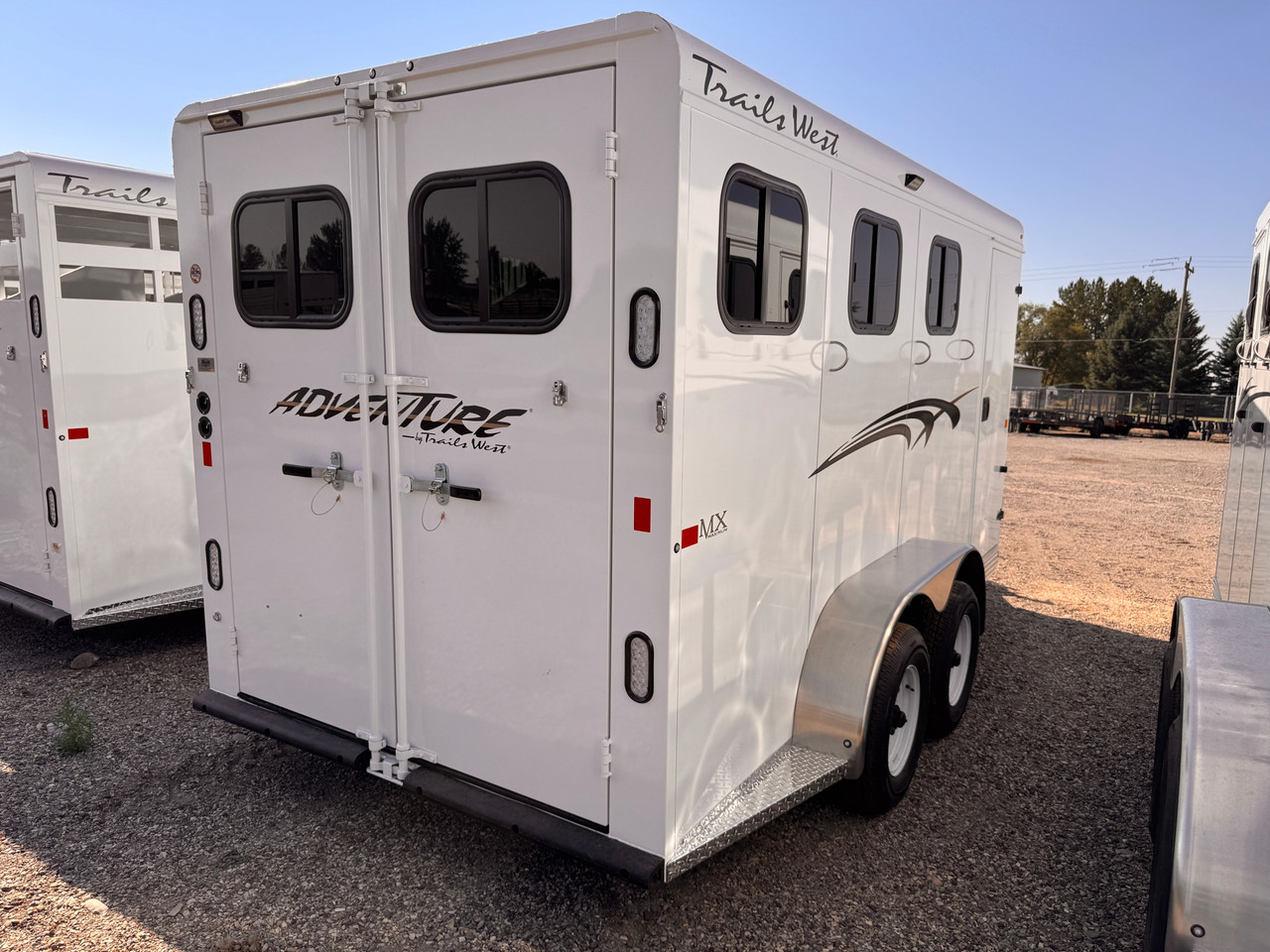 Trails West Trailers 2027 ADVENTURE MX Horse Trailer | Tandem Axle Axle 9.98K, 3-Horse, Tack Room, Convieince Package, Rear Windows, Swing Out Saddle Rack, Rubber Floors