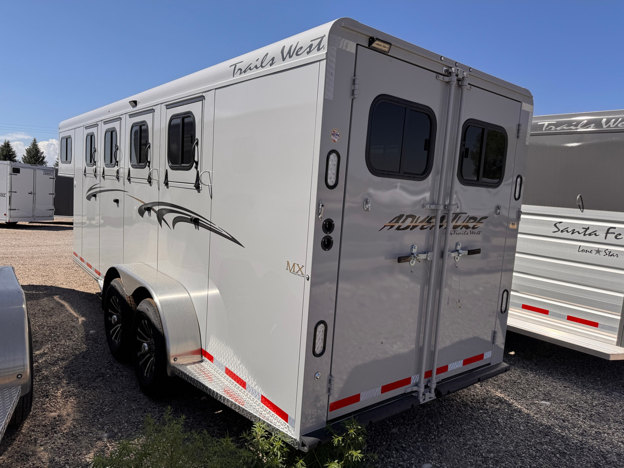 Trails West Trailers 2027 ADVENTURE MX Horse Trailer | Tandem Axle Axle 13.867K, 4-Horse, Convience Package, Titanium Package, Swing Out Saddle Rack, Water Tank, Aluminum Wheels, Rear Barn Doors