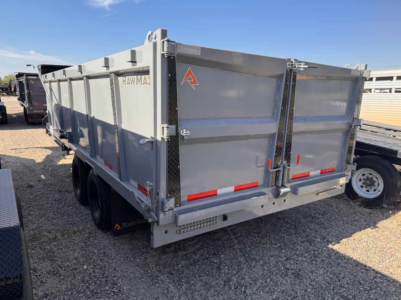 Raw Maxx Trailers 2026 HDX 102"X20' Dump Trailer | Tandem Axle Axle 20K, Dual Tires, Dual Hydraulic Jacks, 44" Sides, Spare Tire, 2 Way Spreader Gate, Tarp Kit, Solar, Dual Storage Cabnets, Ramps