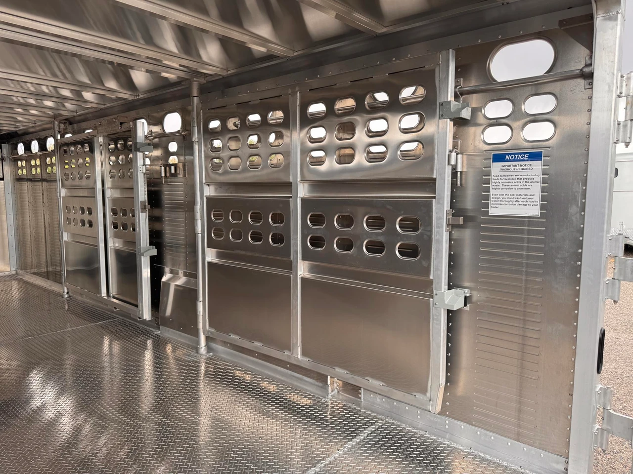 Wilson Trailers 2027 Punchside 84"X24' Stock Trailer | Alluminum, PSGN-5724, 16KGVWR, 7K AXLES, TIE RAIL INSIDE, 8 TIE LOOPS OUTSIDE, RUNNING BOARDS,