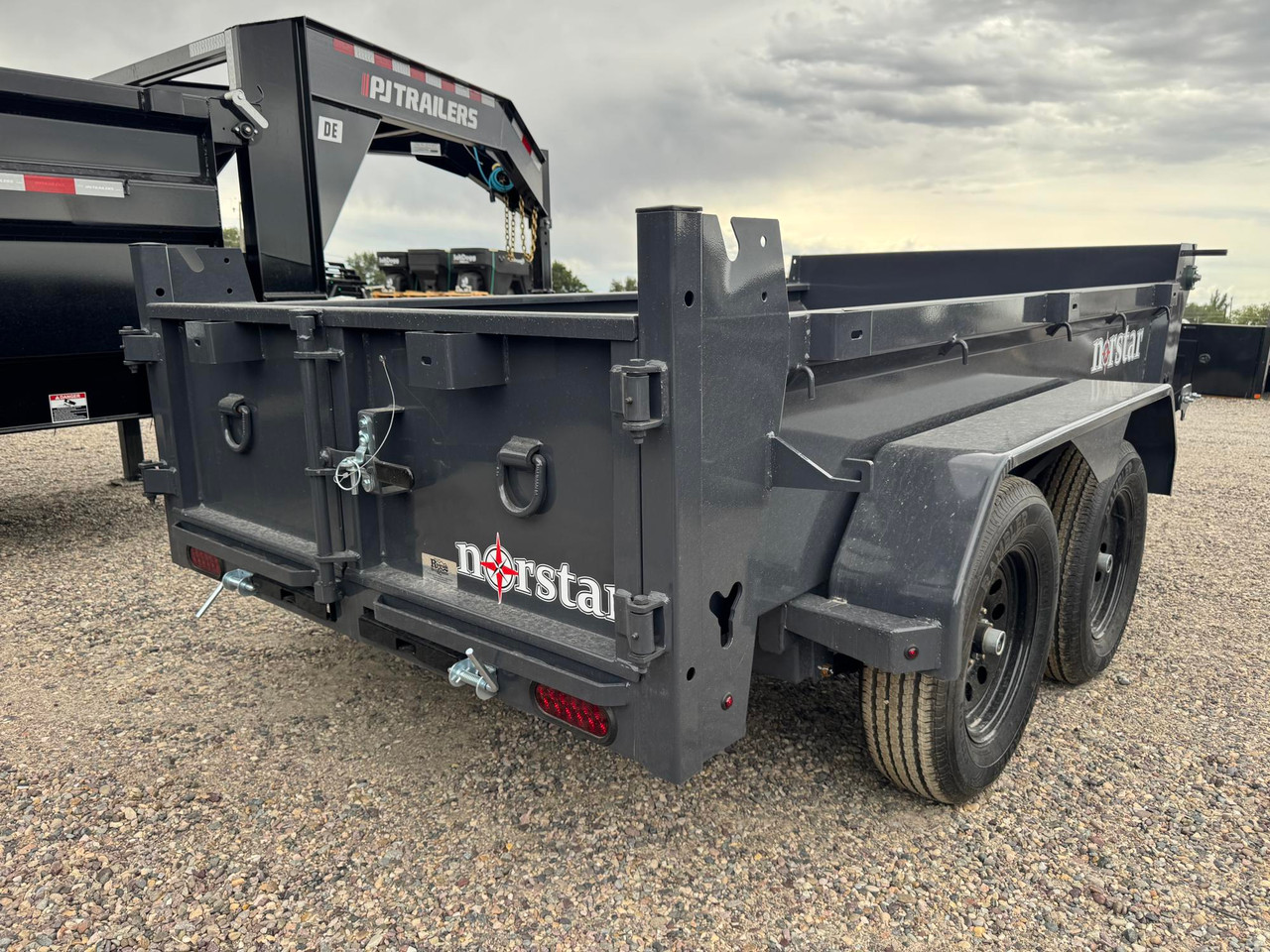 Norstar Trailers 2027 DCB 60"X10' Single Ram Dump Trailer | Tandem Axle, 60"X10' DCB TANDEM AXLE DUMP, CYLINDER LIFT, 20" SIDES 12 GUAGE, SWING DOORS, TARP, 7K GVWR (3500 LBS AXLES)