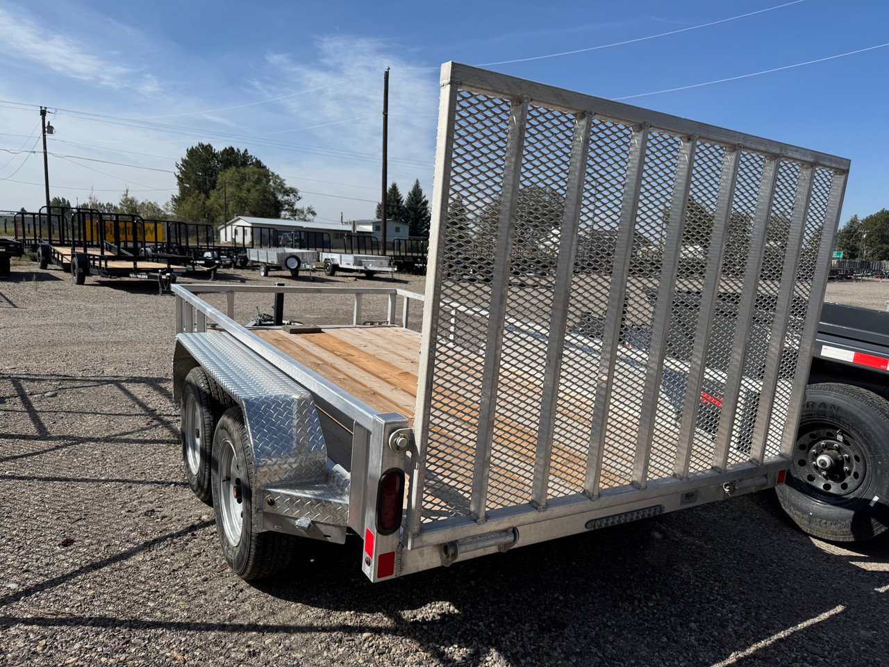 Nordtek Trailers 2025 UT 72"X12' Utility Trailer | Tandem Axle 7K, Wood Deck, Open Sides, Rear Ramp Gate, Brakes Both Axles