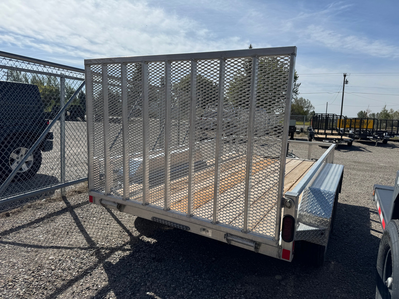 Nordtek Trailers 2025 UT 72"X12' Utility Trailer | Tandem Axle 7K, Wood Deck, Open Sides, Rear Ramp Gate, Brakes Both Axles