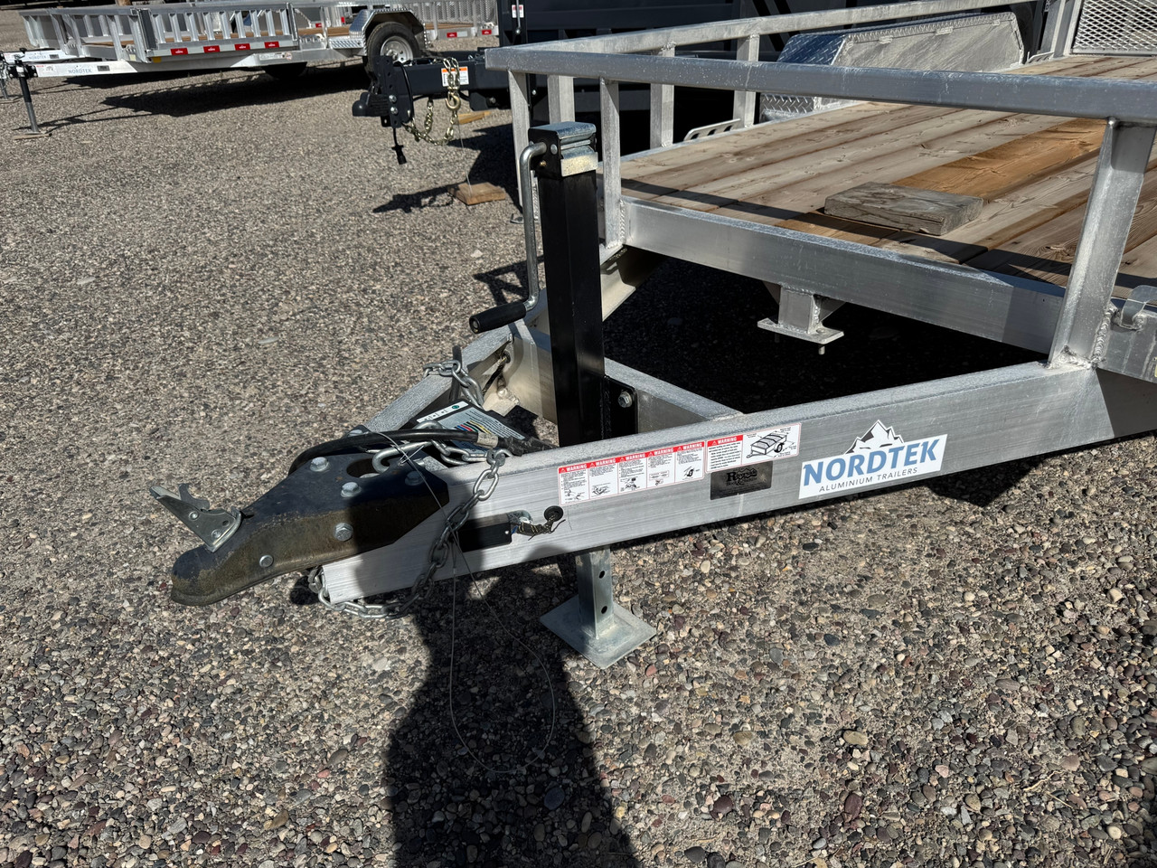 Nordtek Trailers 2025 UT 72"X12' Utility Trailer | Tandem Axle 7K, Wood Deck, Open Sides, Rear Ramp Gate, Brakes Both Axles