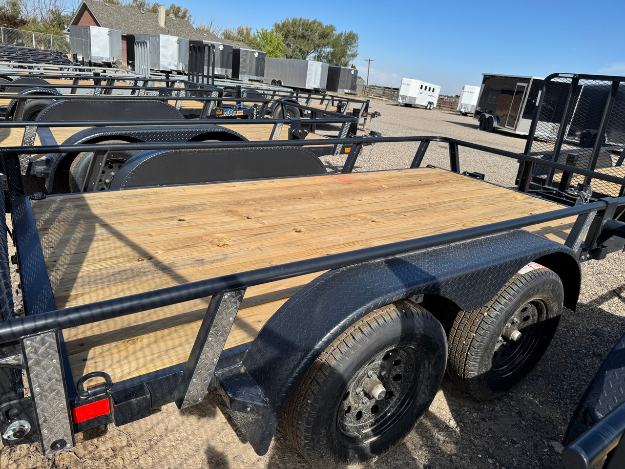 Raw Maxx Trailers 2027 UTX 77"X12' Utility Trailer | Tandem Axle 7K, 2" Round Pipetop Rails, 4' Rear Ramp Gate, Spare Tire Mount, 8 Ply Tires