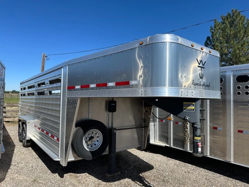 Wilson Trailers 2023 2023 84"X20' Stock Trailer | Tandem Axle Axle 14K | Slat Side Aluminum, Extra Wide Escape Door, 7K Axles, Rear Combo Door, 1 Divider, Aluminum Raised Floor