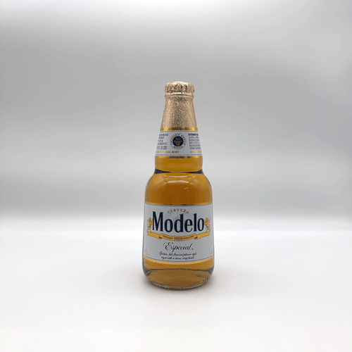 A 12 fluid ounce bottle of Modelo Especial Mexican Beer