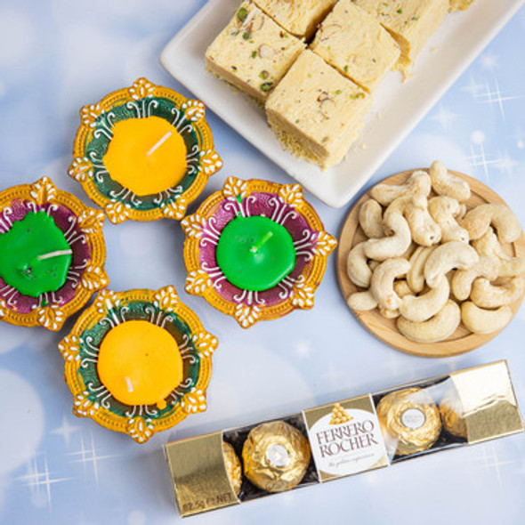 Clay Decorated Diya with Soan Papdi with Cashews & Ferrero Chocolates