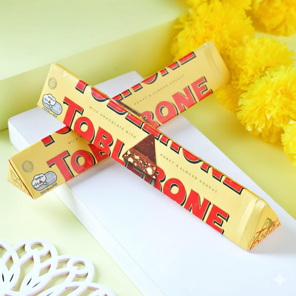 Bhaidooj Thread with Toblerone Chocolate Bhaidooj Thread with Toblerone Chocolate