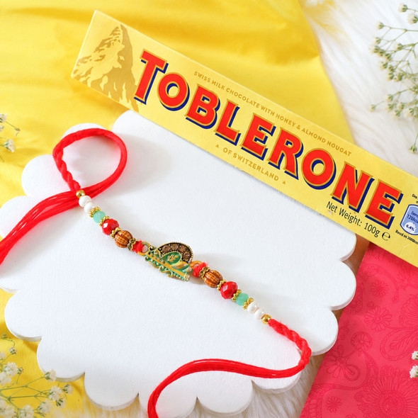 Krishna Bansuri Rakhi With Toblerone Chocolate
