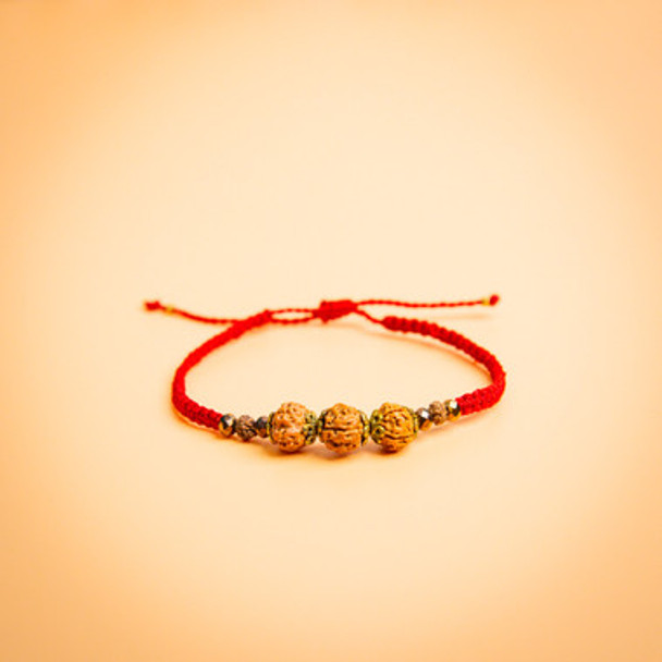 Genuine Five  Rudraksha  Beads And Gold Crystal Beads In Red Woven Thread