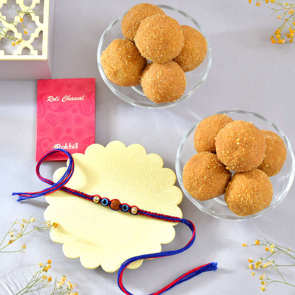 Rudraksha Rakhi With Besan Laddoo Sweet Rudraksha Rakhi With Besan Laddoo Sweet