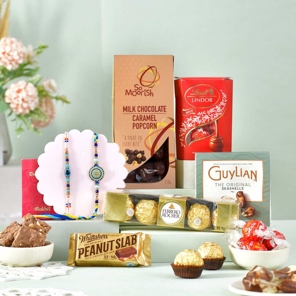 Set of 2 Rakhis With Assorted Gourmet Hamper