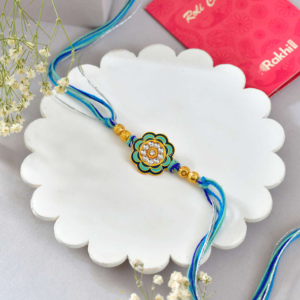 Floral Rakhi with Radha Krishna 10gm Silver Coin