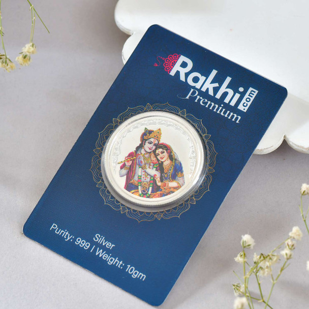 Floral Rakhi with Radha Krishna 10gm Silver Coin