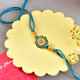 Floral Shaped Bhai Rakhi Gourmet Hamper