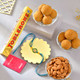 Floral Shaped Bhai Rakhi Gourmet Hamper