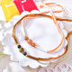 Elegant Set of 2 Beaded Rakhi with Doda Burfi