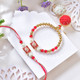 Elegant  Bhaiya Bhabhi Rakhi Combo with Kaju Katli