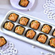 Pack of 4 Designer Rakhis with Baklawa Sweet