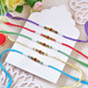 Set of 5 Rudraksha & Pearl Designer Rakhi Collection with Besan Laddoo