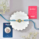 Floral Rakhi with Radha Krishna 10gm Silver Coin