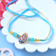 Personalized Rakhi Gift Set with Ganesha Rakhi, Sweets & Dry Fruits