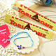 Little Krishna Kid's Rakhi With Toblerone Chocolates
