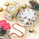 Gold Plated Shubh Ganesh Rakhi with Kaju Katli & Ferrero Rocher Combo