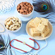 Gold Plated Divine Om Rakhi with Dry Fruit & Sweet Hamper