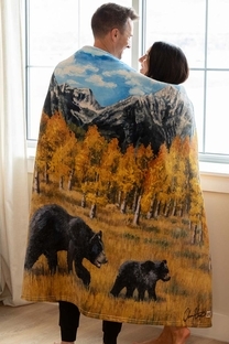 Sherpa Throw Blanket being worn by couple standing up