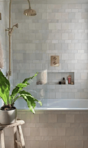 Hinged Frameless Shower Screen over the bath
