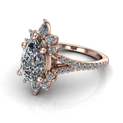pear diamond engagement ring worn on finger front view