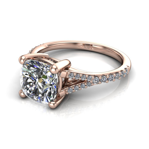 cushion diamond engagement ring worn on finger front view
