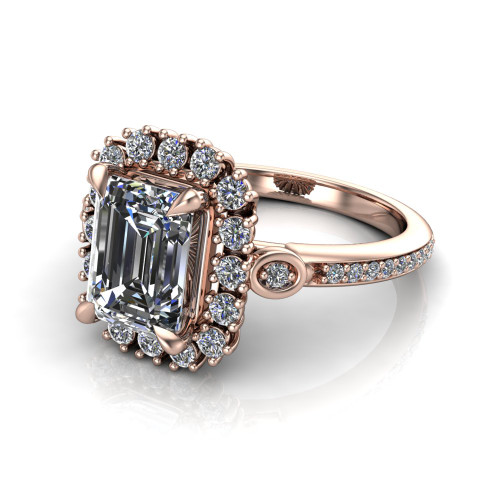 emerald cut diamond engagement ring worn on finger front view