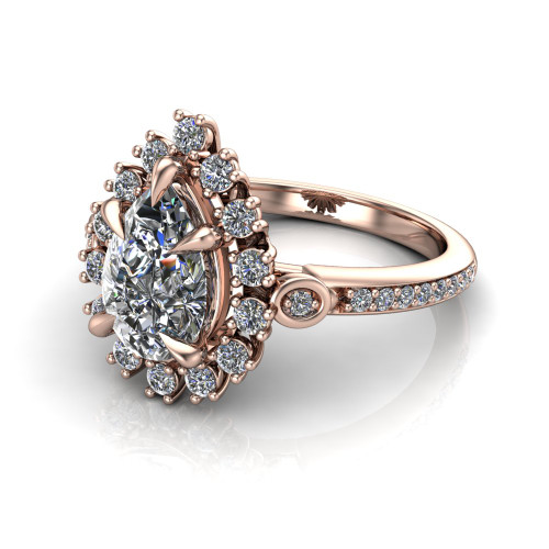 pear diamond engagement ring worn on finger front view