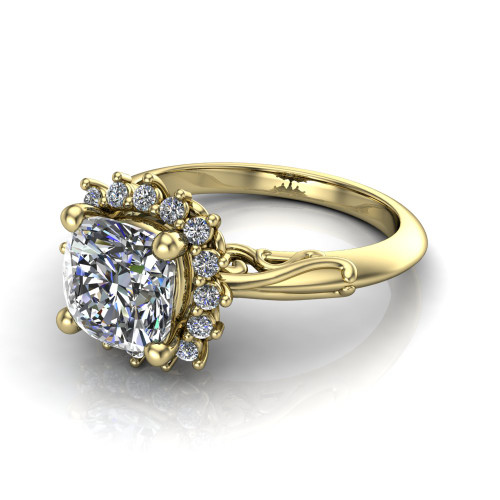 cushion diamond engagement ring worn on finger front view