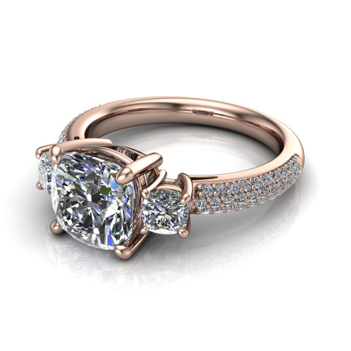cushion diamond engagement ring worn on finger front view
