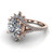 round diamond engagement ring worn on finger front view