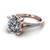 oval diamond engagement ring worn on finger front view