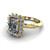 emerald cut diamond engagement ring worn on finger front view